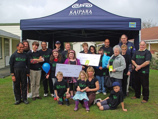 Ready... Set... Recycle!  Representatives from Kaipara District Council,  Kaipara Refuse Ltd and recycling supporters celebrate at the Mangawhai Markets.